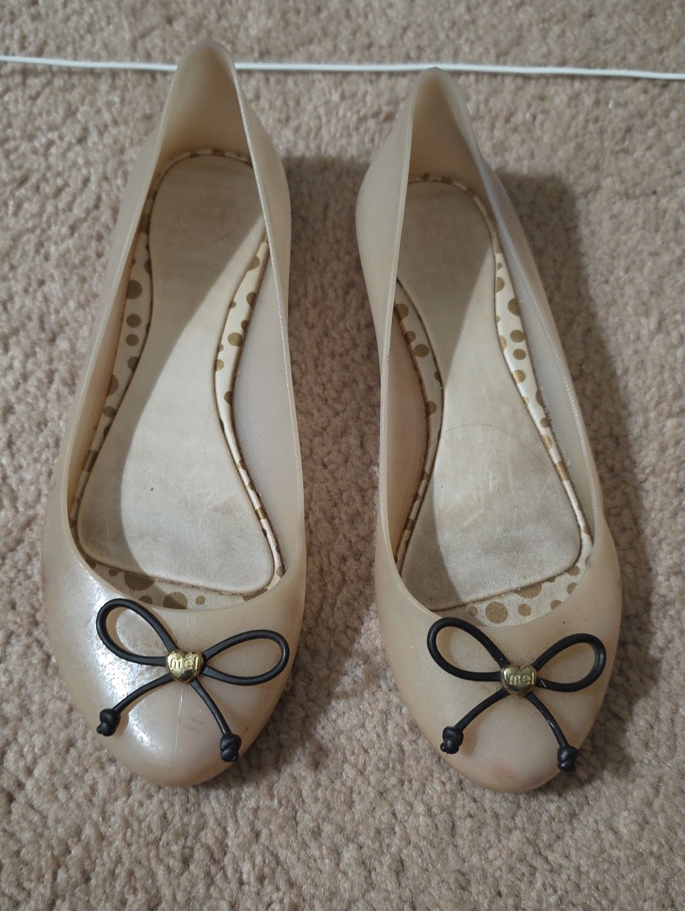 Melissa Cream Ballet Flats with Black Bow and Gold Charm